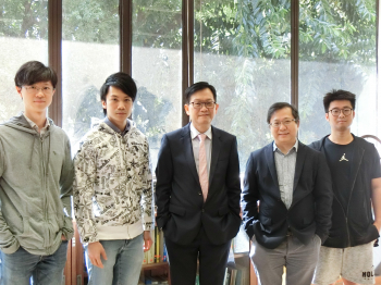 Professor N. Mok (centre) and his research team members